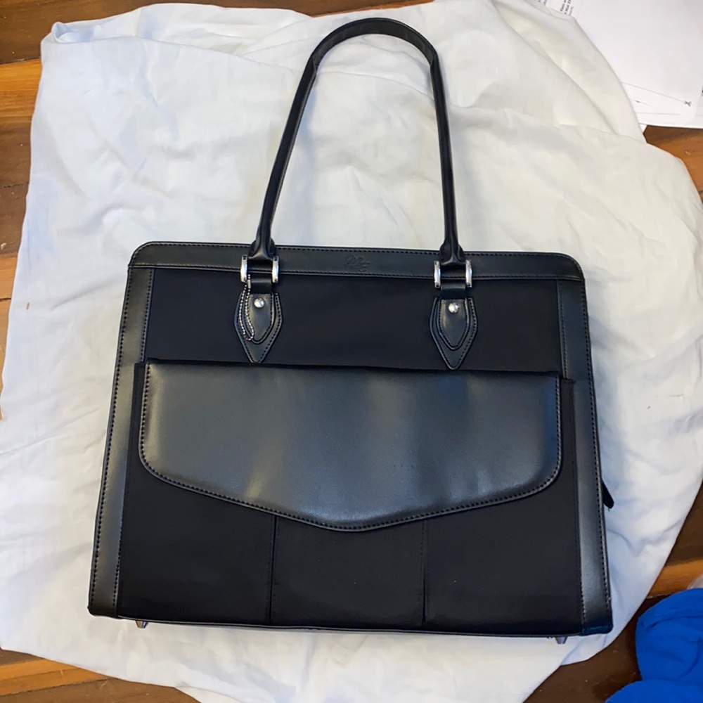 bag with small attached bag black NWOT. Never used